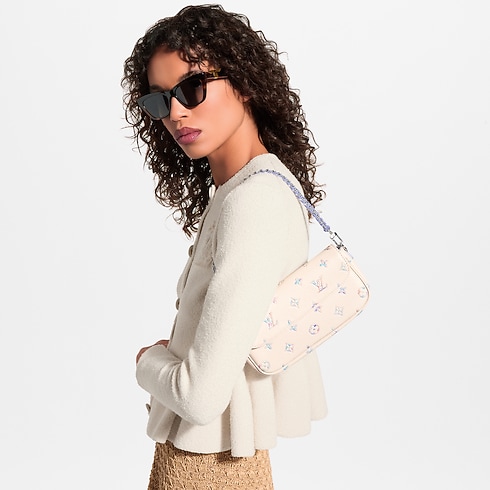 Portefeuille chaîne Ivy Cuir Monogram Empreinte in Femme's Portefeuilles et petite maroquinerie Portefeuille chaîne et micro sacs collections by Louis Vuitton (Zoom produit)