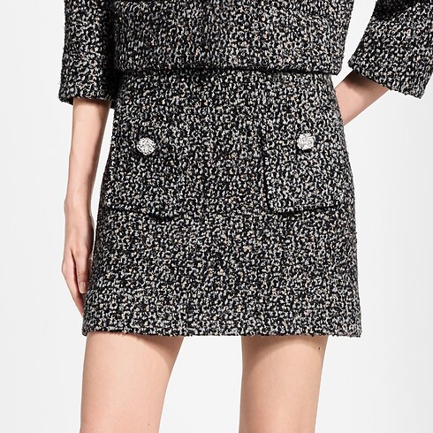 Rock aus glitzerndem Tweed mit Schmuck-Knopf zugeschnittene Ansicht