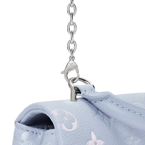 Sac Nano Madeleine Cuir Monogram Empreinte in Femme's Portefeuilles et petite maroquinerie Portefeuille chaîne et micro sacs collections by Louis Vuitton (Zoom produit)