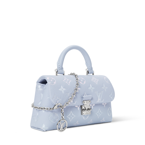 Sac Nano Madeleine Cuir Monogram Empreinte in Femme's Portefeuilles et petite maroquinerie Portefeuille chaîne et micro sacs collections by Louis Vuitton (Zoom produit)